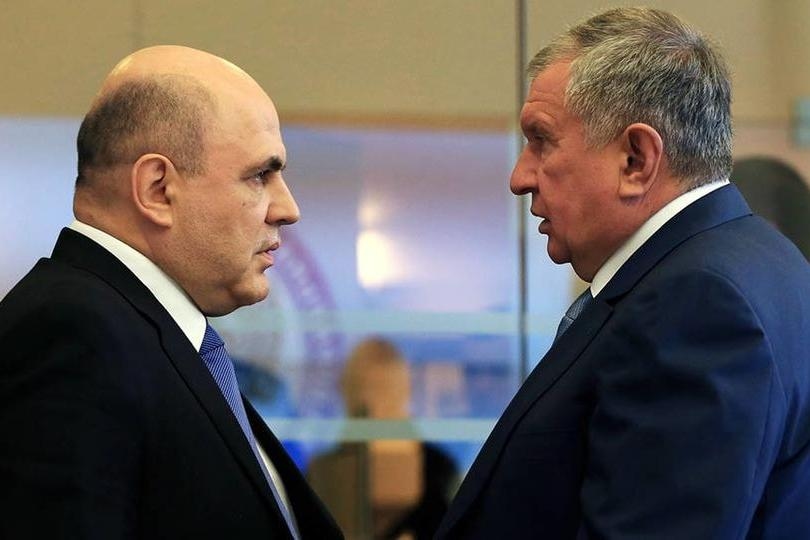Примьер-министр Михаил Мишутсин и глава «Роснефти» Игорь Сечин. Фото: РИА «Новости»