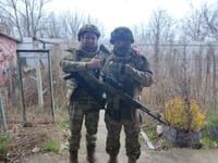 Deputy Political Officer Badranov, safe and sound (left)