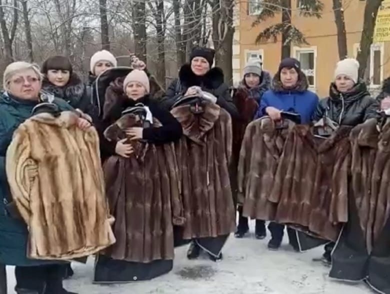 Widows of Russian fighters gifted fur coats for video report, then asked to return them