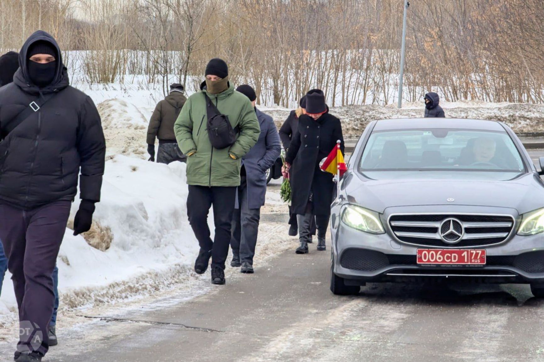 A vehicle from the Spanish Embassy in Moscow pulls up to Borisovskoye Cemetery, where Navalny is buried.