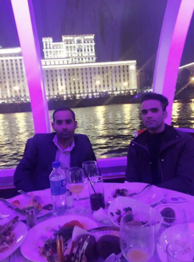 A photo of Rahmatullah Azizi, left, with his brother Hedayatullah Azizi, right, in a restaurant in Moscow across the river from The Russian Defense Ministry, which oversees the GRU. The photo was retrieved from Azizi’s Facebook page in 2019. 