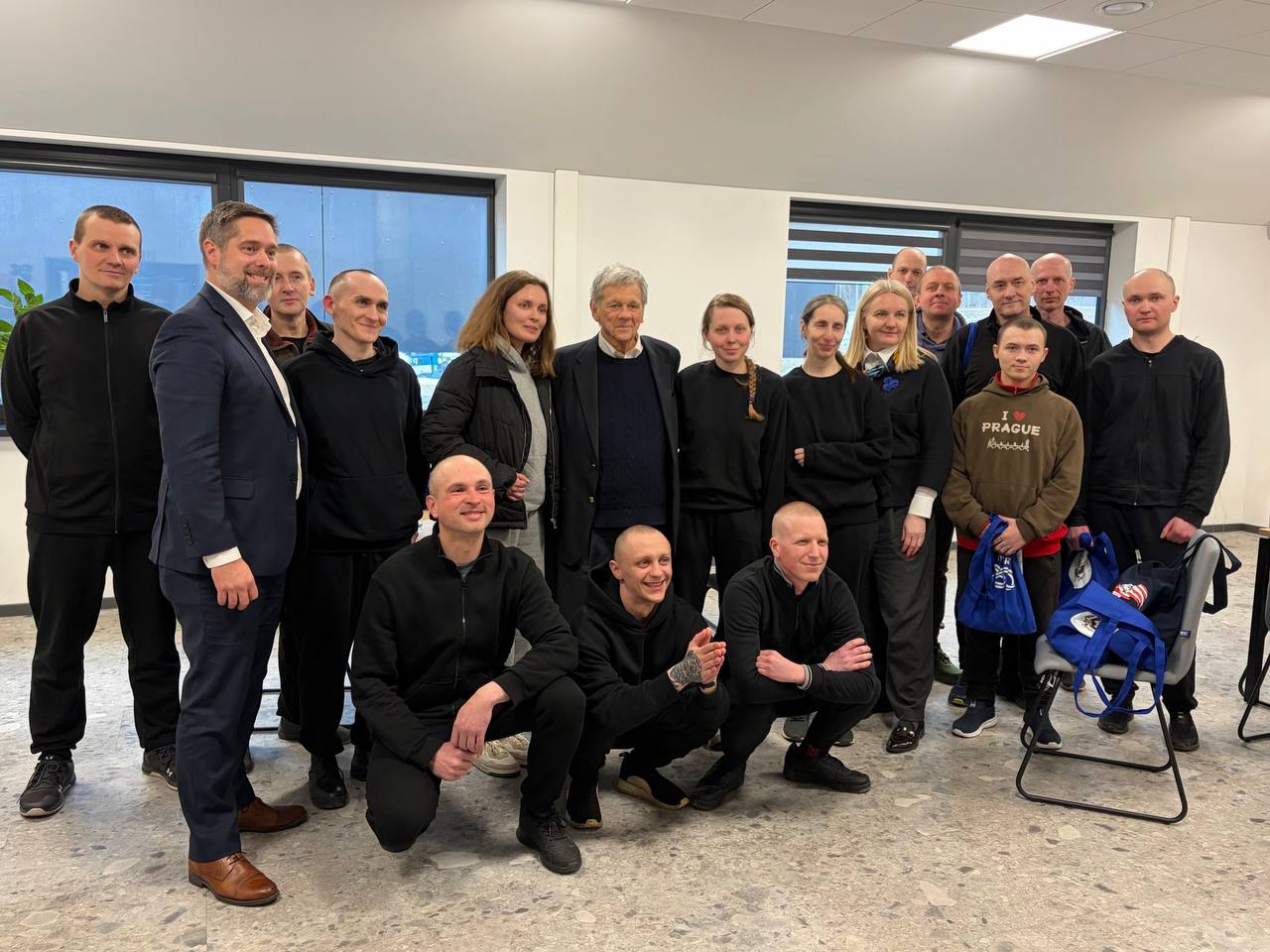 A group of former Belarusian political prisoners pose after their release on March 19, 2026. Photo: Human Rights Center Viasna